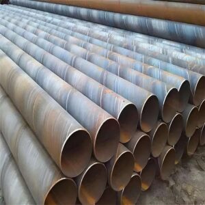 Large-diameter spiral welded pipe stacked on site ready for oil and gas pipeline installation